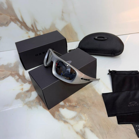 GAFAS OAKLEY GRIS