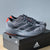 ADIDAS ADIZERO EVO SL GRIS