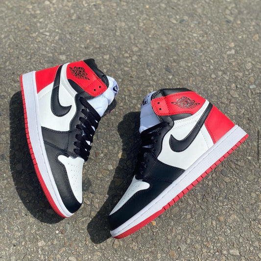 JORDAN RETRO 1 BLANCA - ROJA